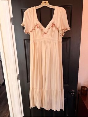 Cream colored midi dress with floral embroidery